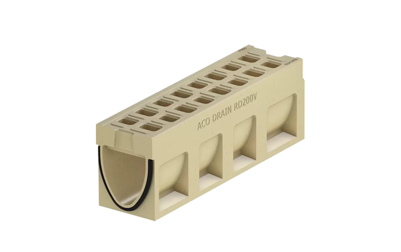 Beige monolitisk markränna med små hål på ovansidan.