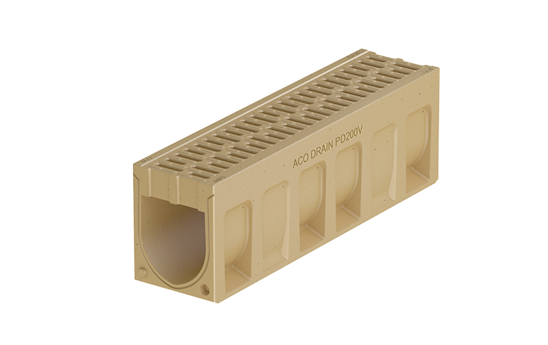 Beige monolitisk markränna med små hål på ovansidan.