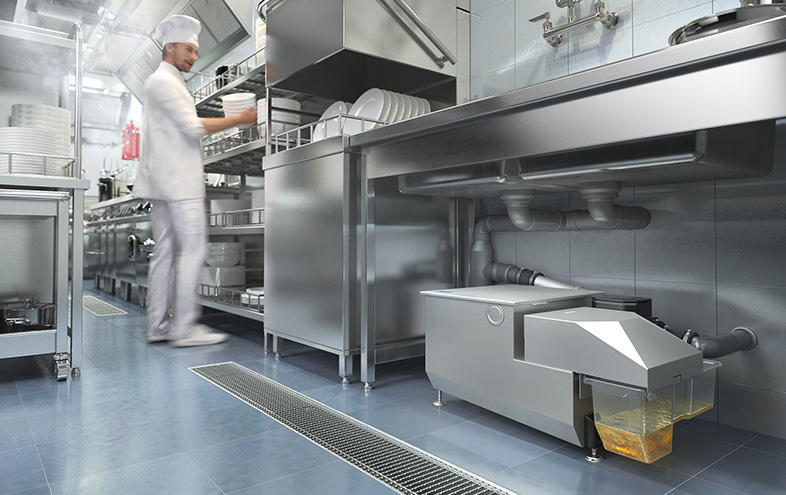 Kock står i köksmiljö.