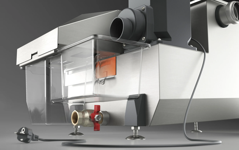 Sidovy över en metallfärgad apparat med behållare och sladd.